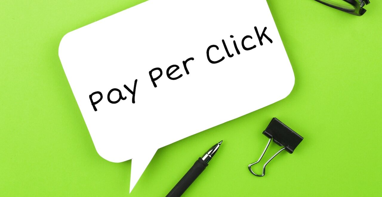 pay per click inscription green background